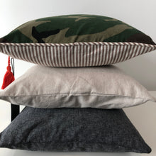 Load image into Gallery viewer, camo lumbar pillow stacked on top of the cream lumbar pillow stacked on top of the grey lumbar pillow 
