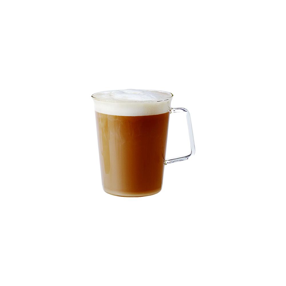 kinto latte glass with coffee in it with a white background