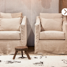 Load image into Gallery viewer, linen Rebecca chairs next to one another in a living room setting
