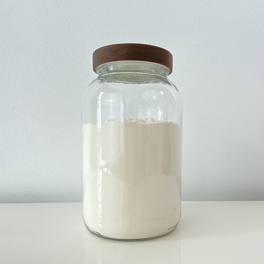 gallon jar on a white table