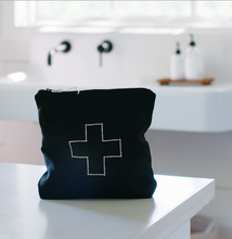 Load image into Gallery viewer, black linen bag with a white plus sign sitting on a table
