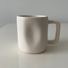 Load image into Gallery viewer, Close up of the white Alex Marshall mug on a white table

